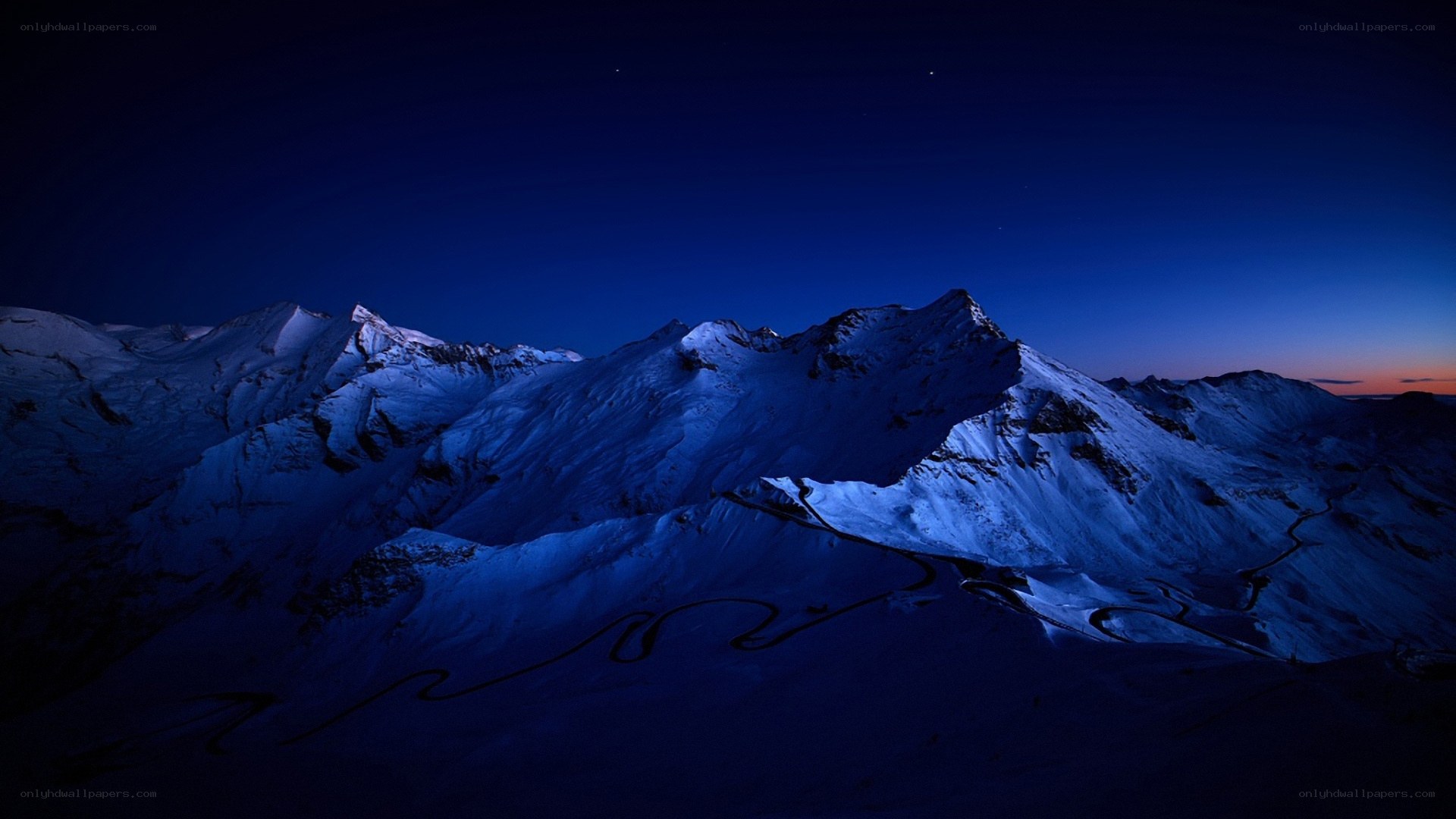 Snowy mountains at twilight