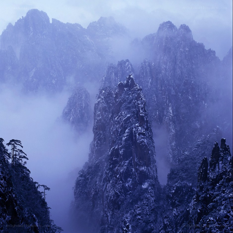 Snowy mountains in mist