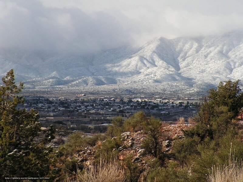 Snowy mountains overlook town