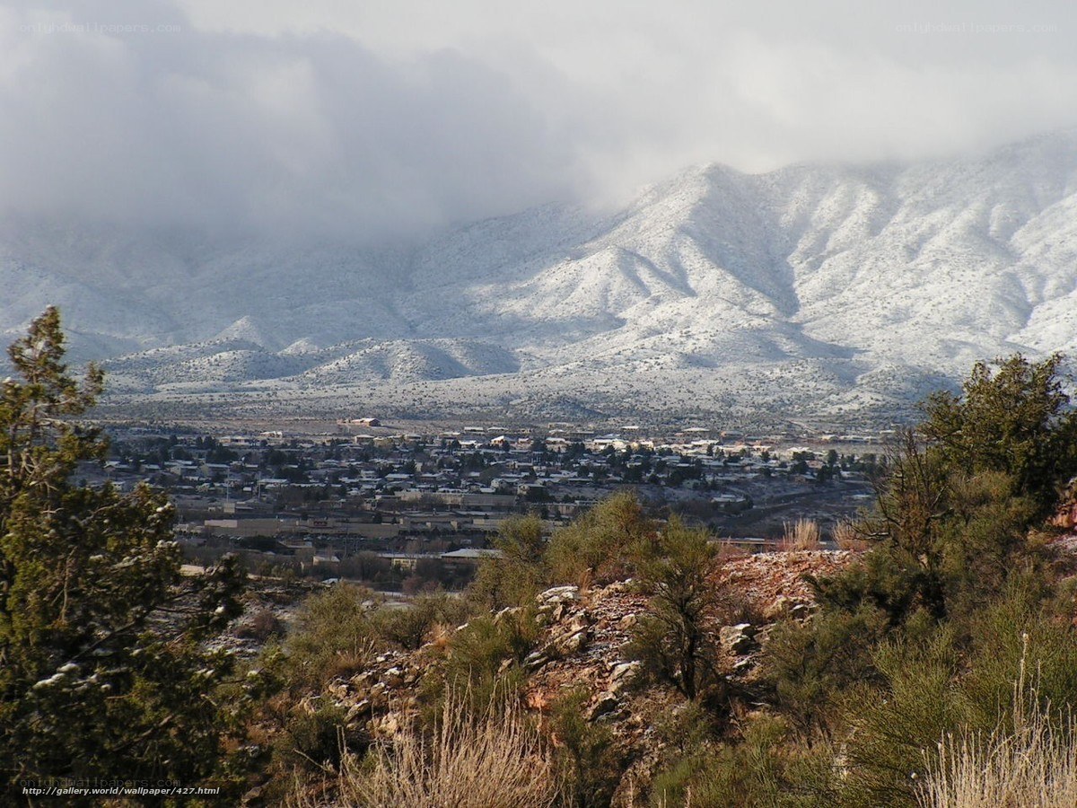 Snowy mountains overlook town