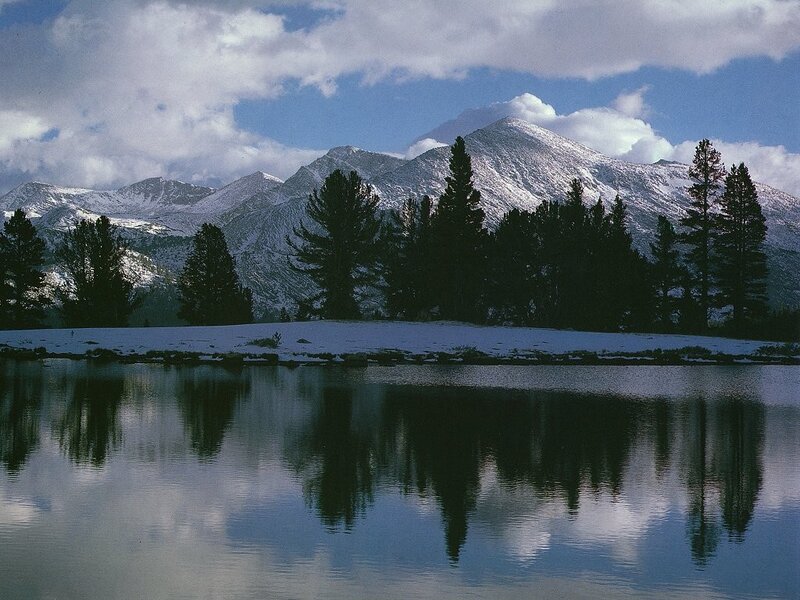 Snowy mountains reflected in a lake