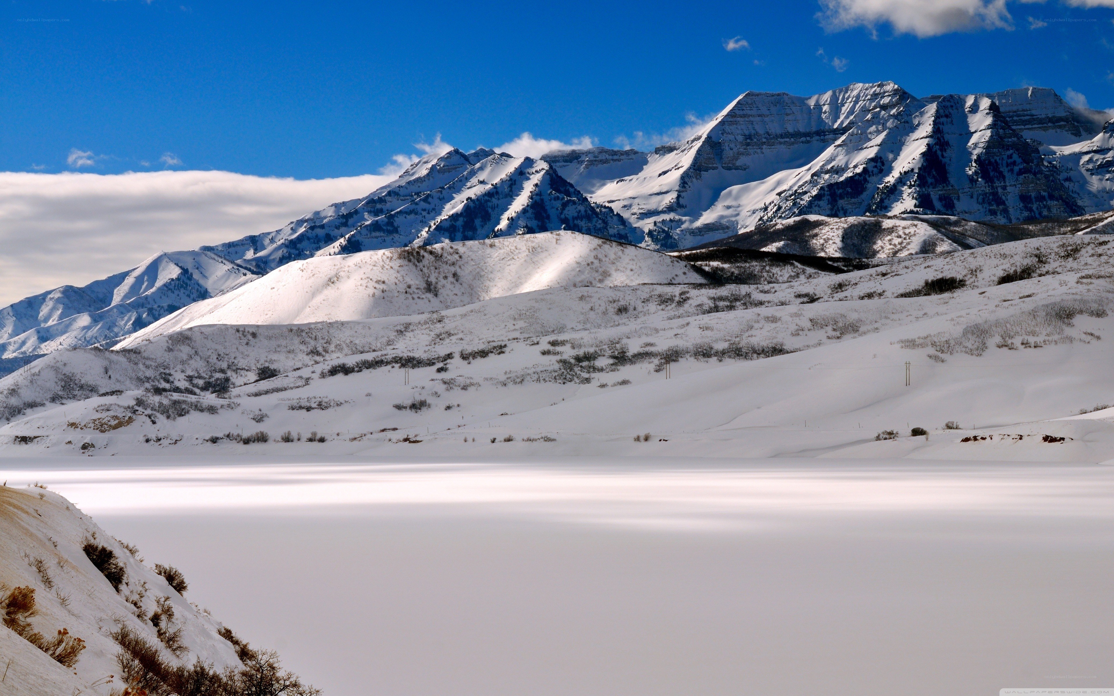 Snowy mountains under blue sky