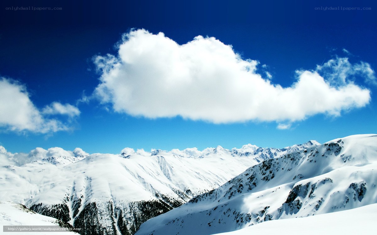 snowy mountains under blue sky