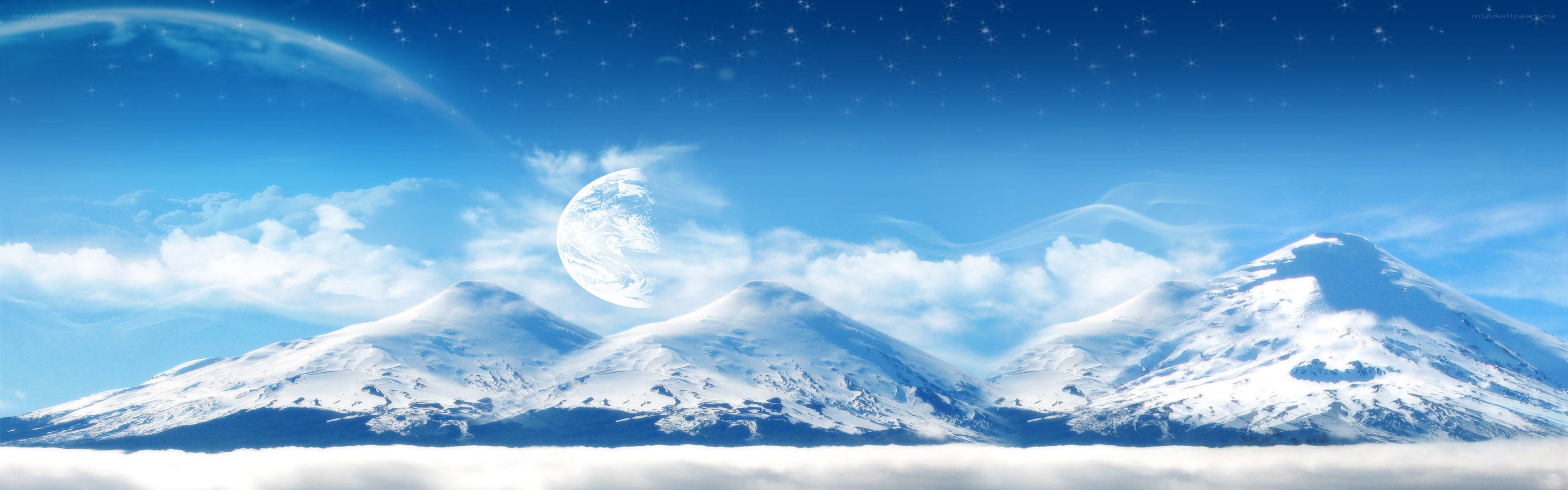 Snowy mountains under starry sky