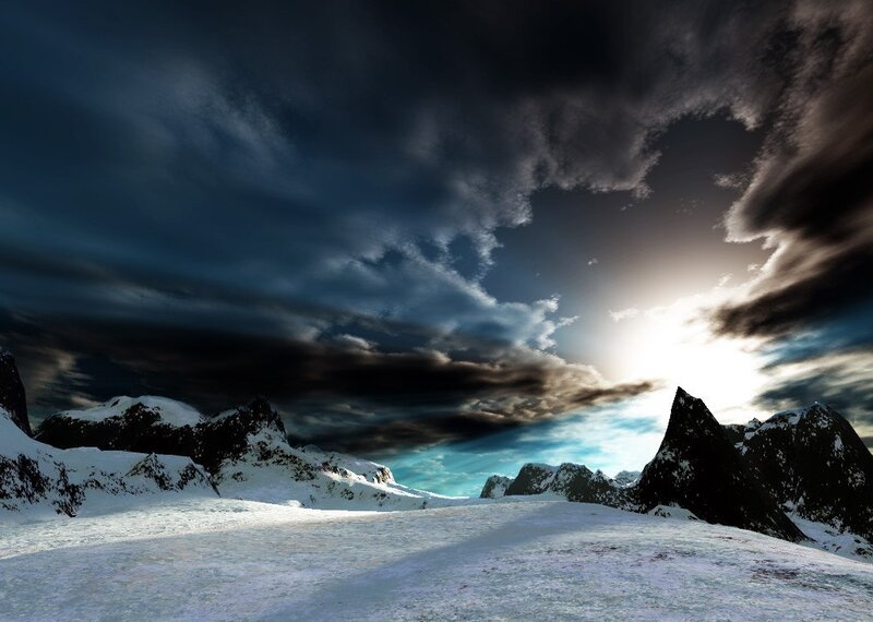 Snowy mountains under stormy sky