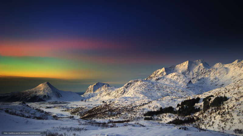 Snowy mountains with aurora