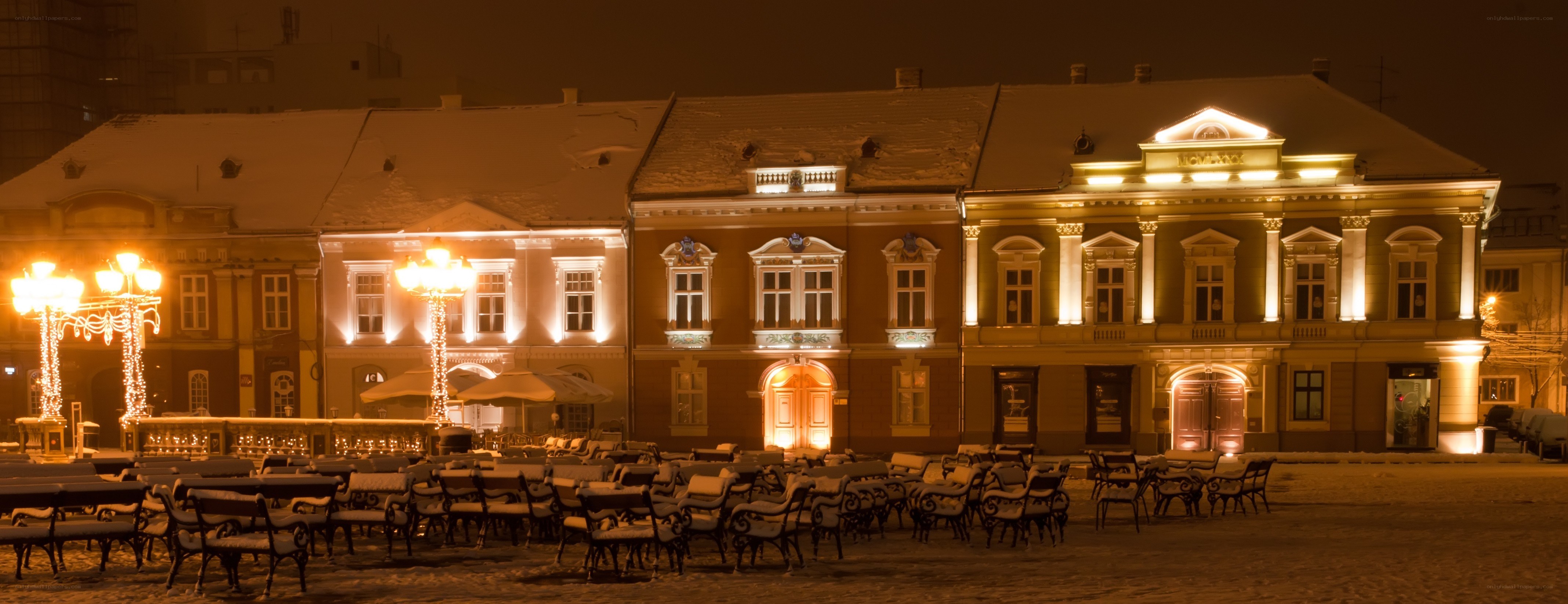 Snowy night at a historic square
