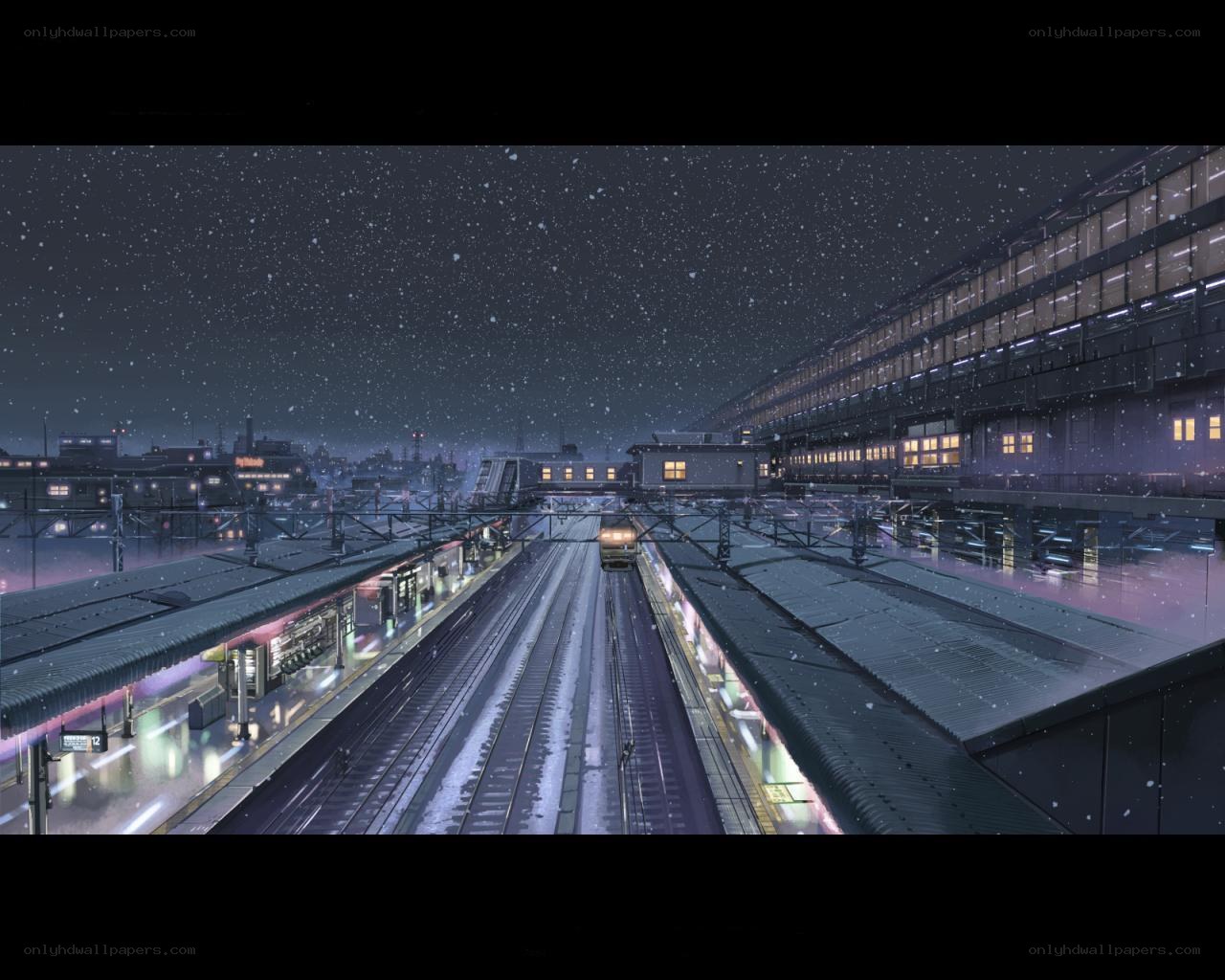 Snowy night at a train station