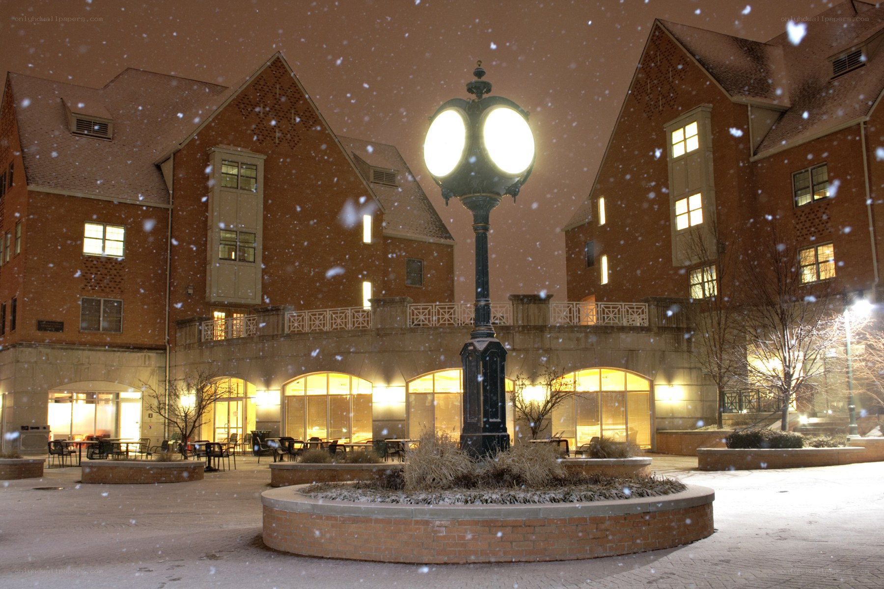 Snowy night at campus courtyard