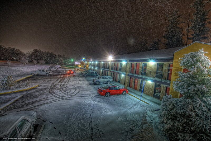 Snowy Night at Motel Parking Lot