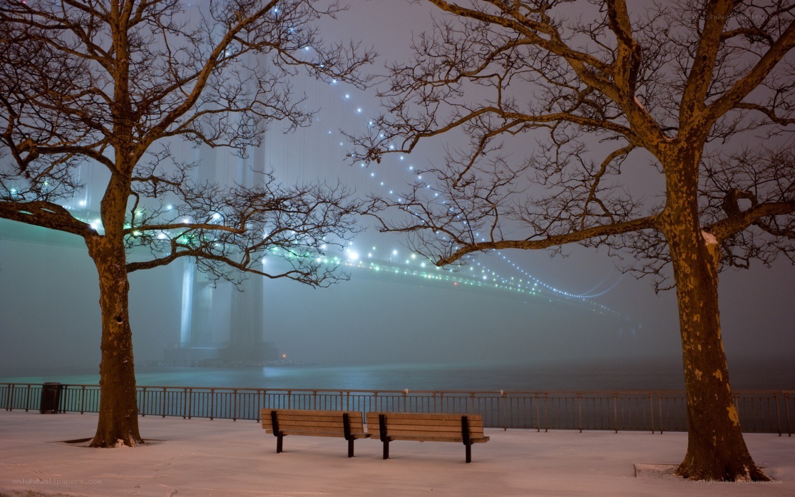 Snowy night by the bridge