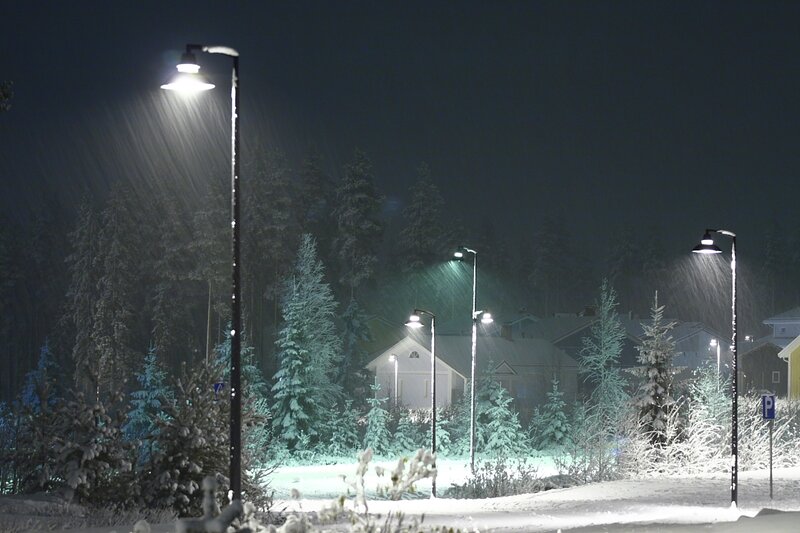 Snowy night in a quiet neighborhood