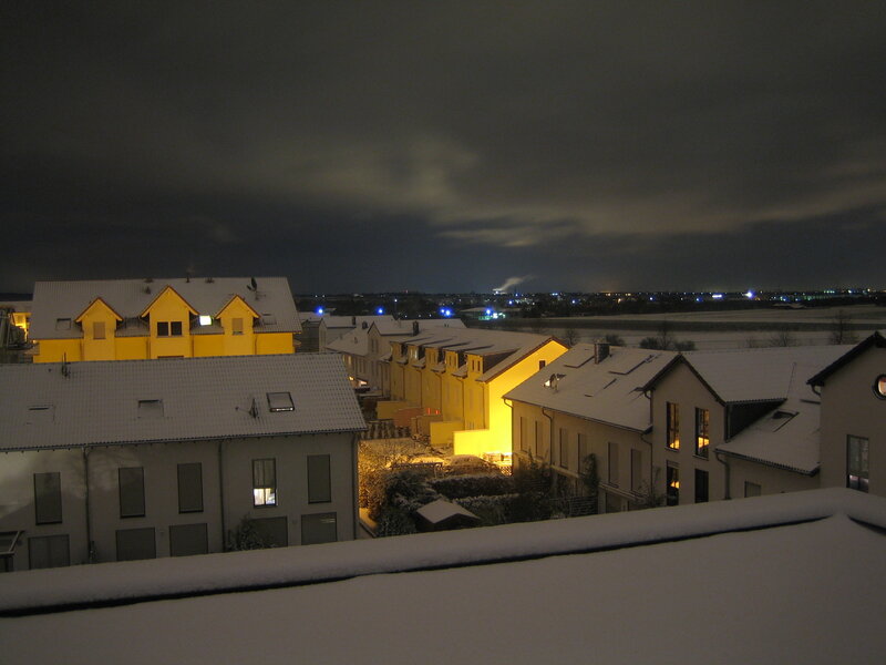 snowy night in a residential area