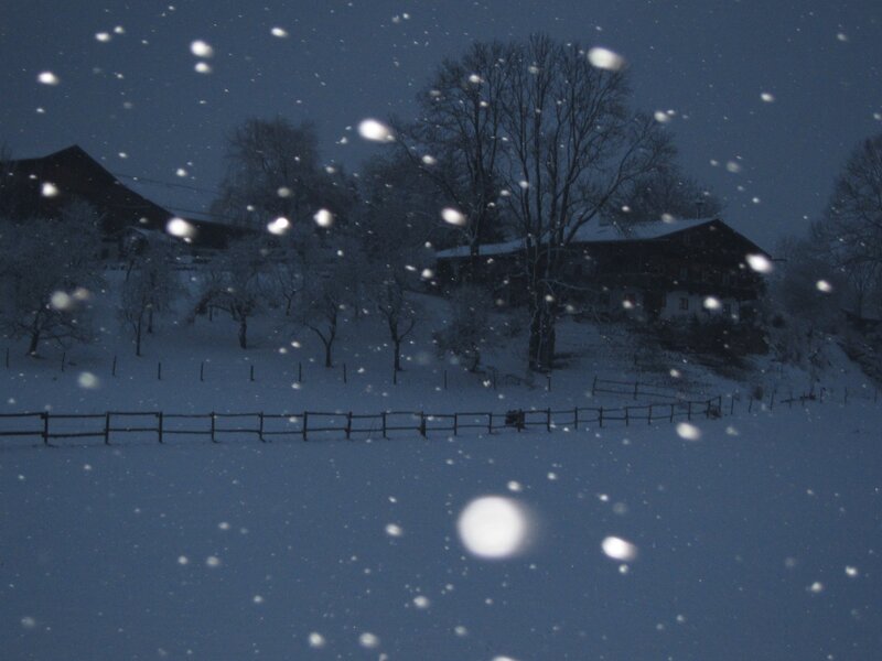 Snowy night in a village