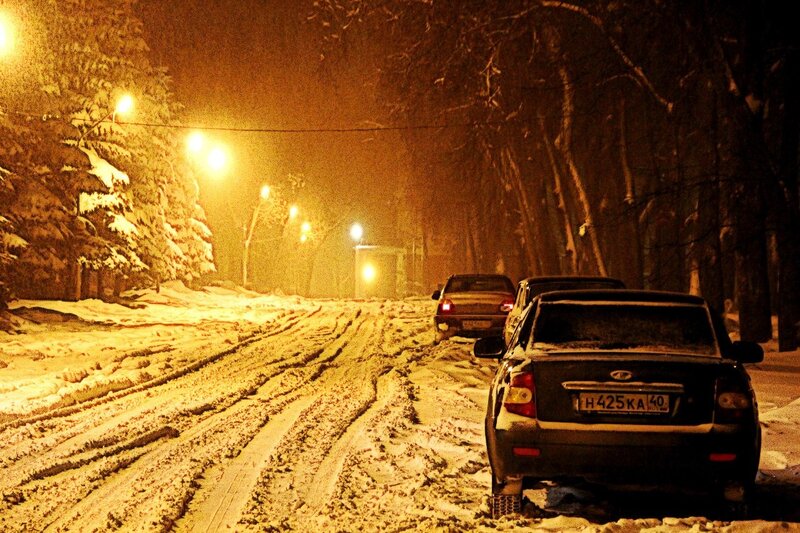 Snowy night on a forest road