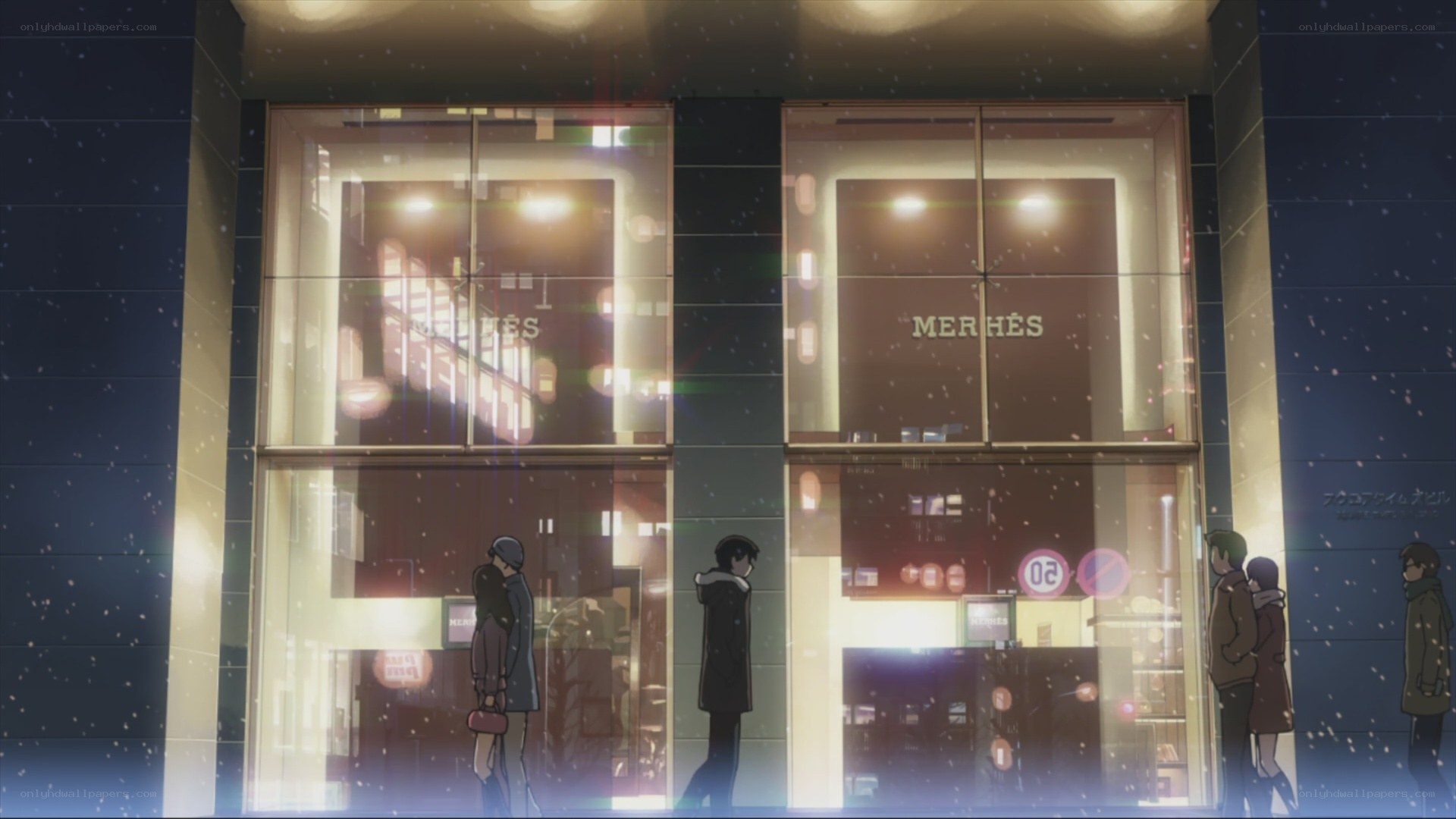 Snowy night outside a store