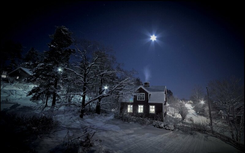 Snowy night with house and moon