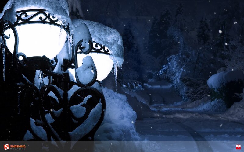 Snowy night with street lamps
