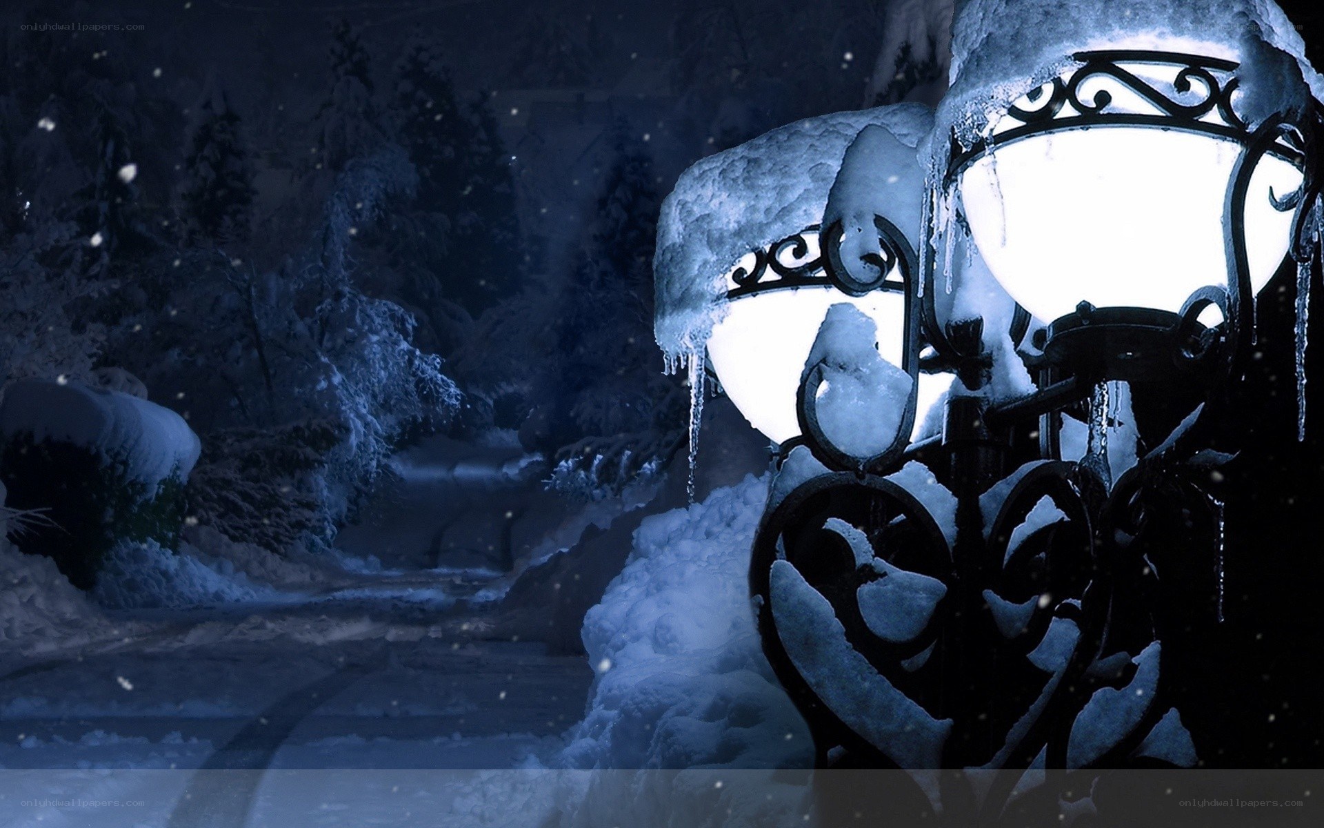 Snowy night with street lamps