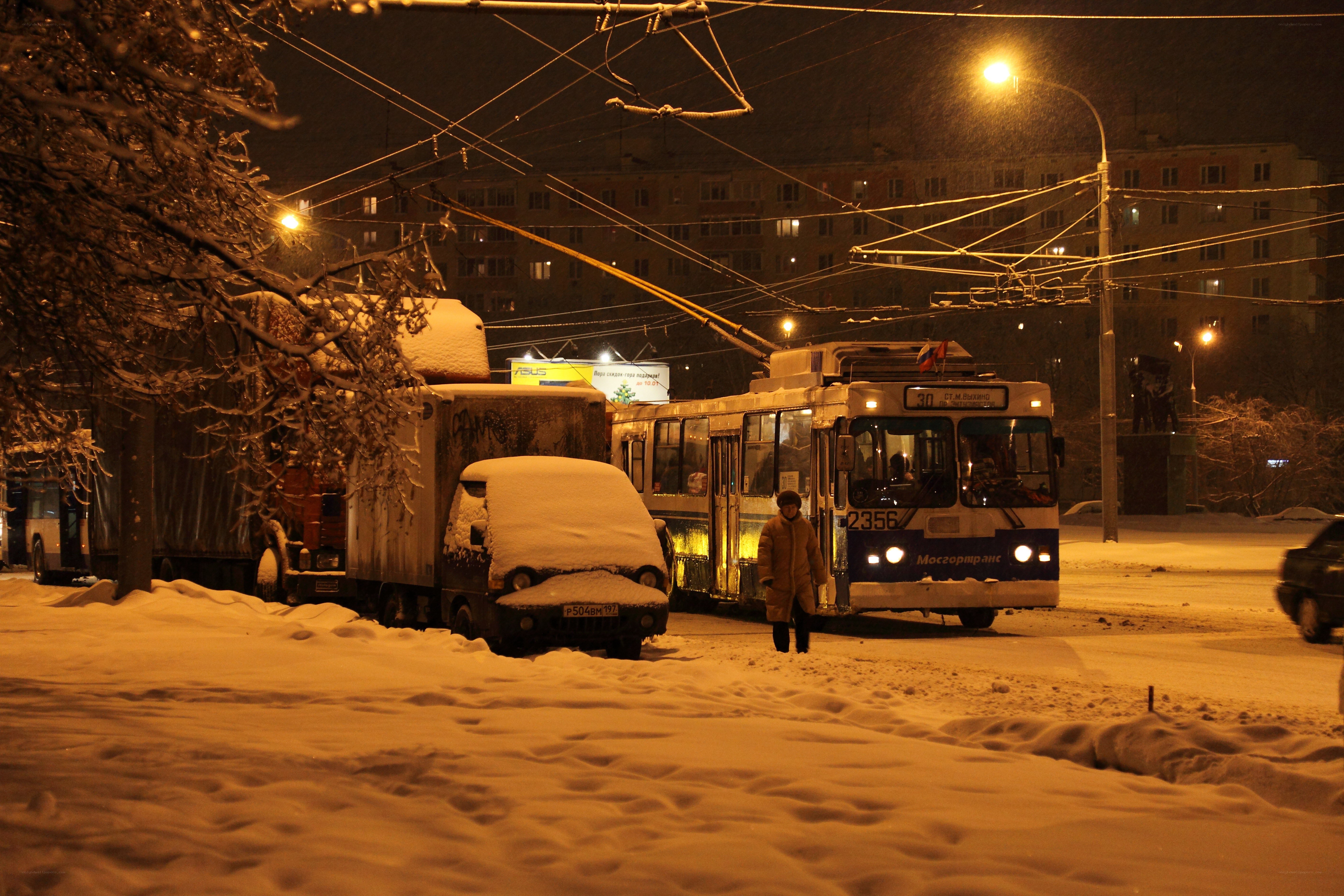 Snowy night with trolleybus