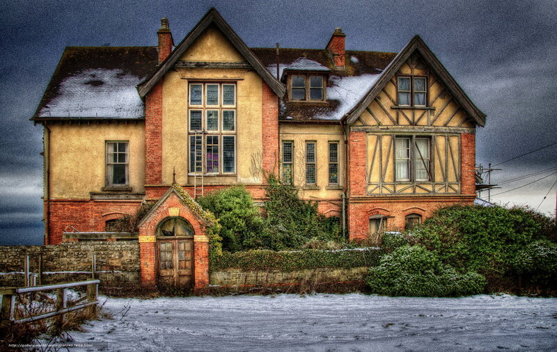 snowy old house in winter