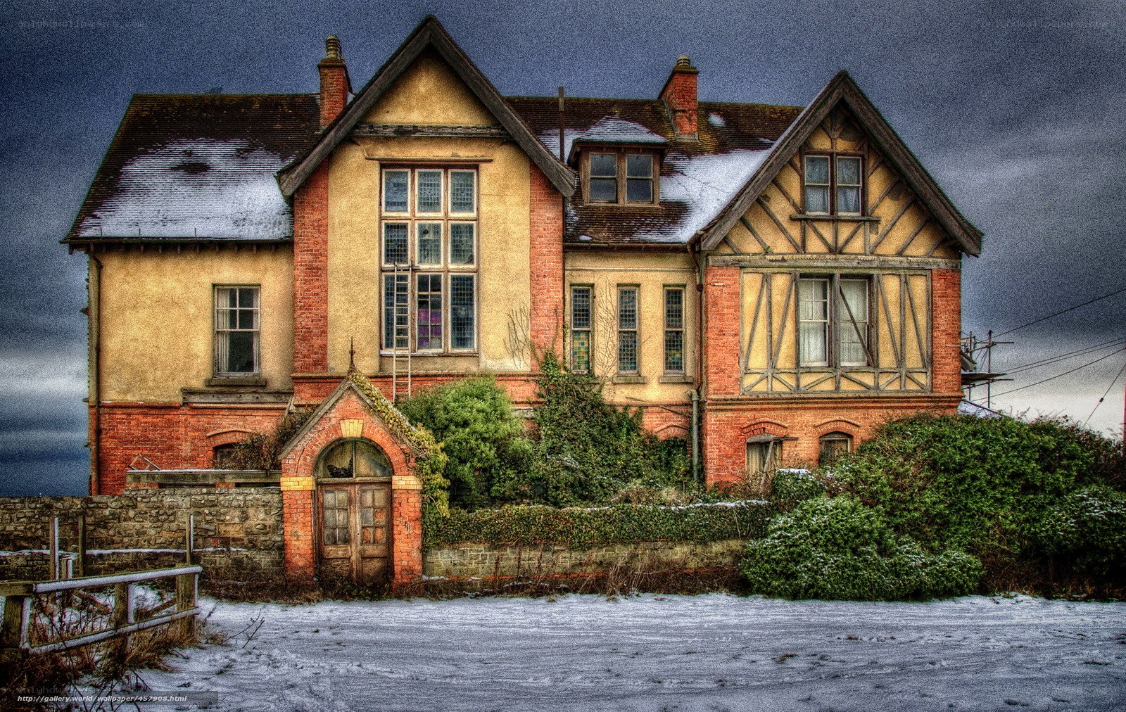 snowy old house in winter