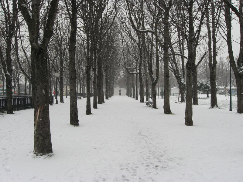 Snowy park path