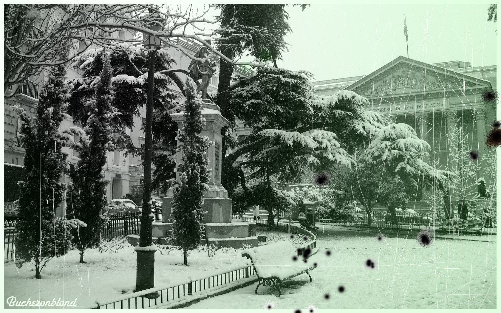 Snowy park with monument