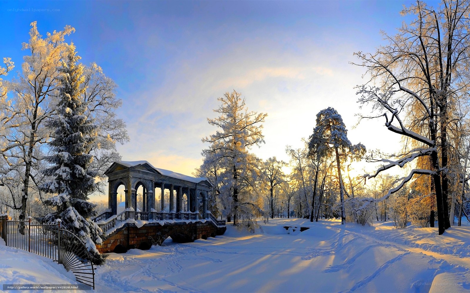 Snowy park with pavilion