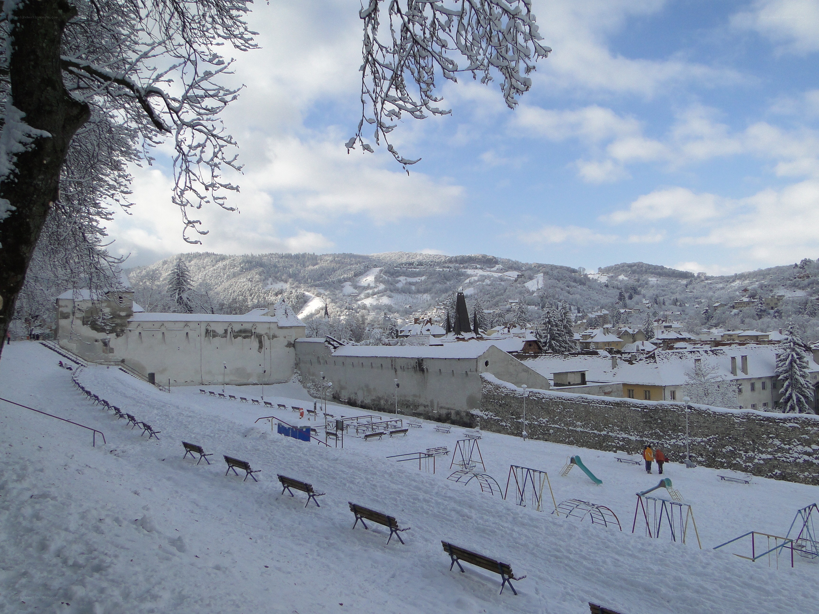 Snowy park with playground