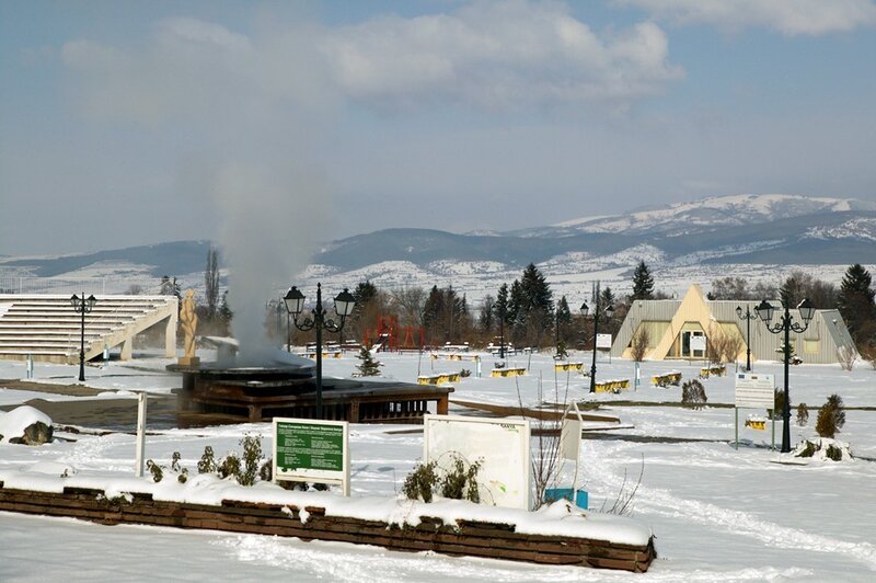Snowy park with steam vent