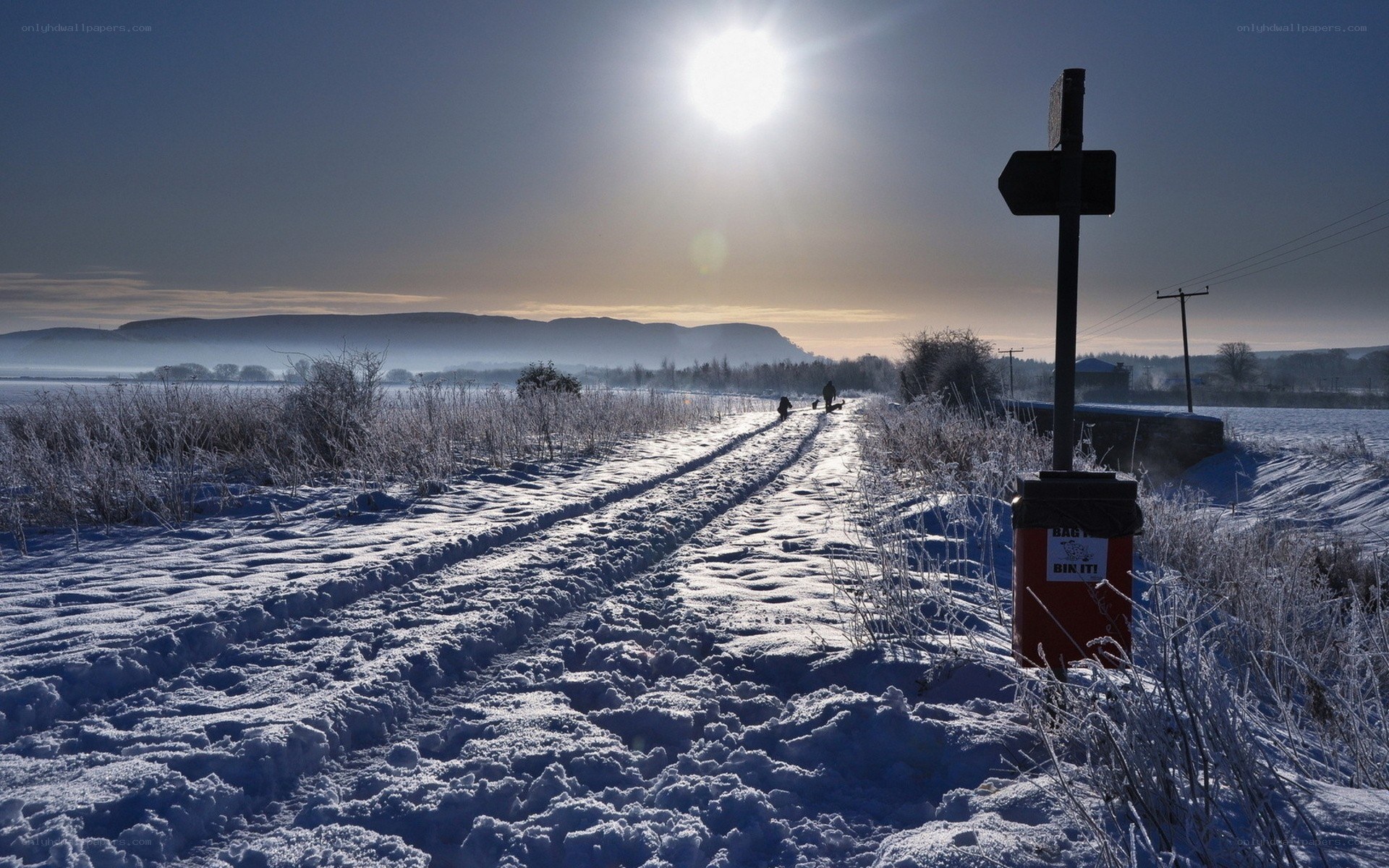 Snowy path at sunrise
