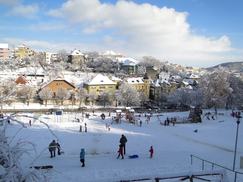 Snowy playground in a city
