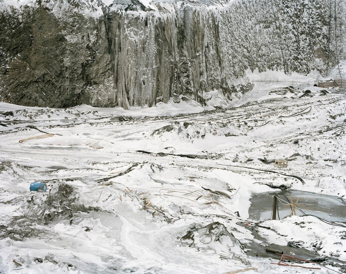 Snowy quarry with ice formations