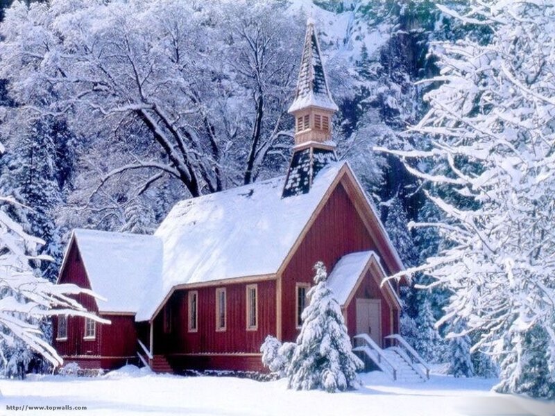 Snowy red chapel in winter