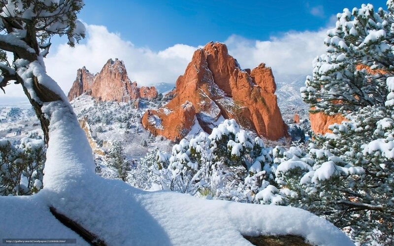 Snowy red rock formations