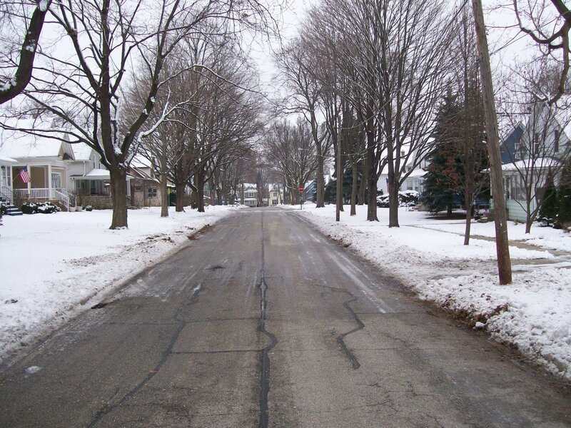 snowy residential street in winter