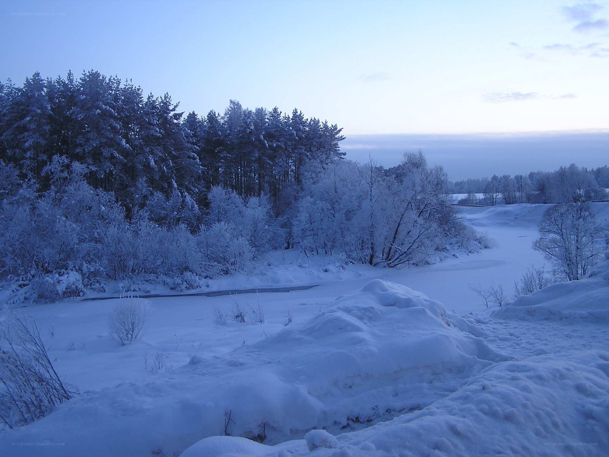 Snowy river at dusk