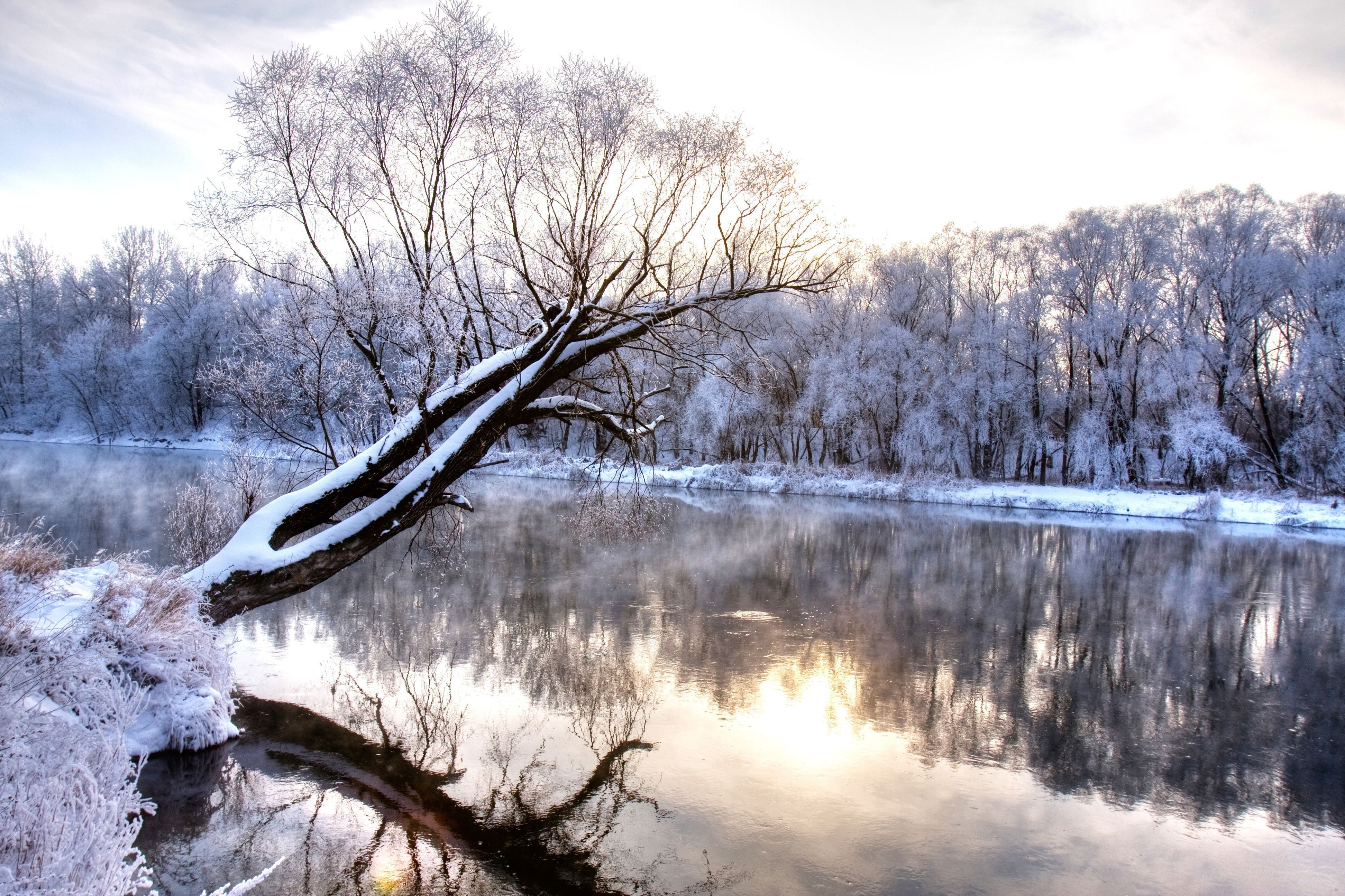 Snowy river at sunrise