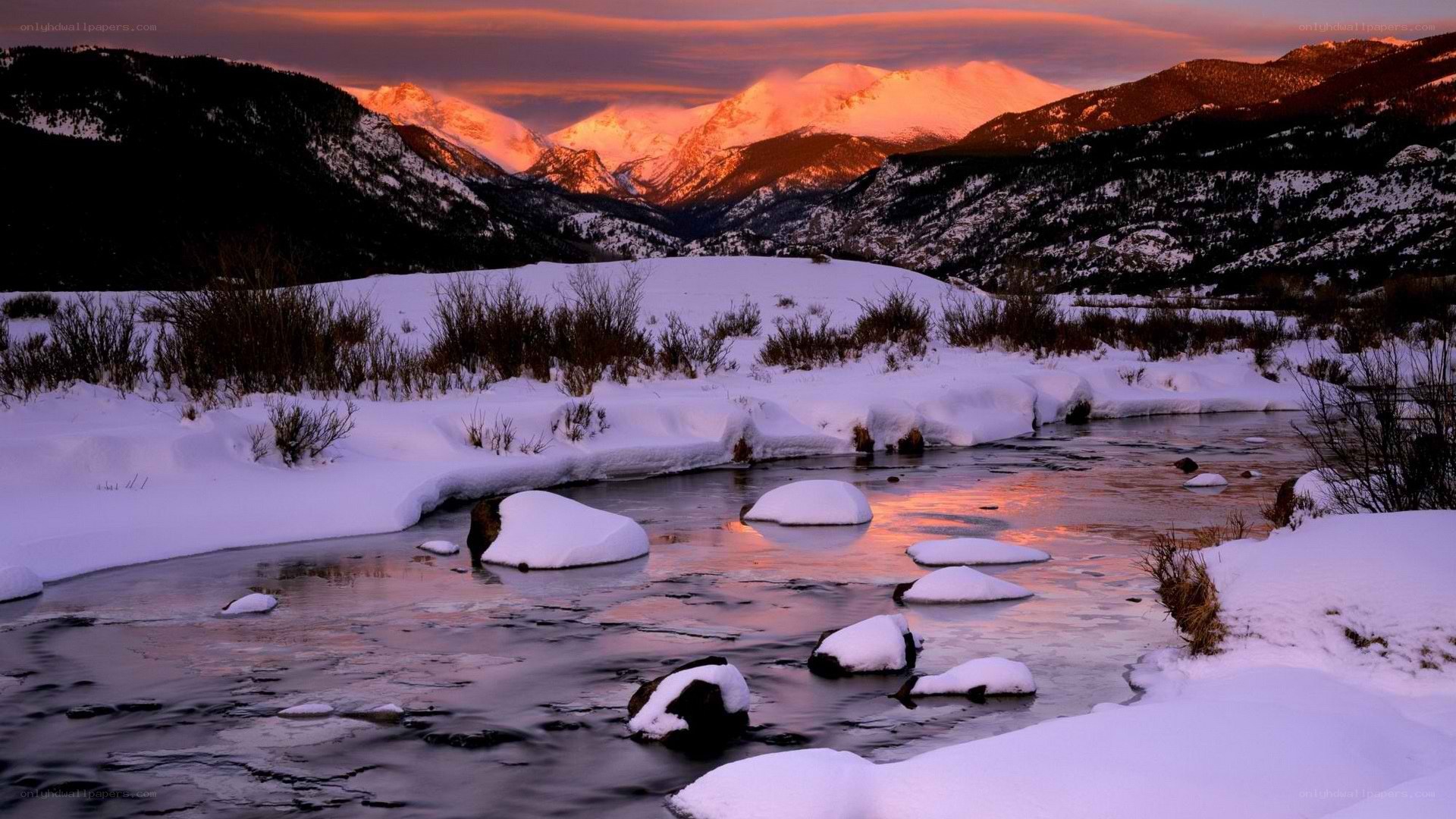 snowy river at sunset