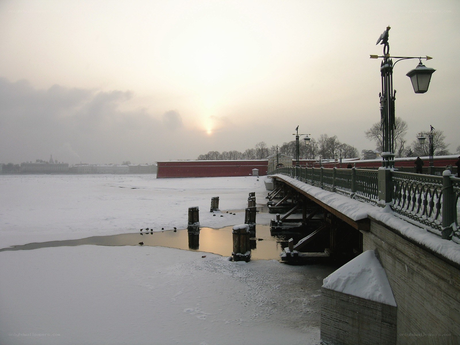 Snowy river at sunset