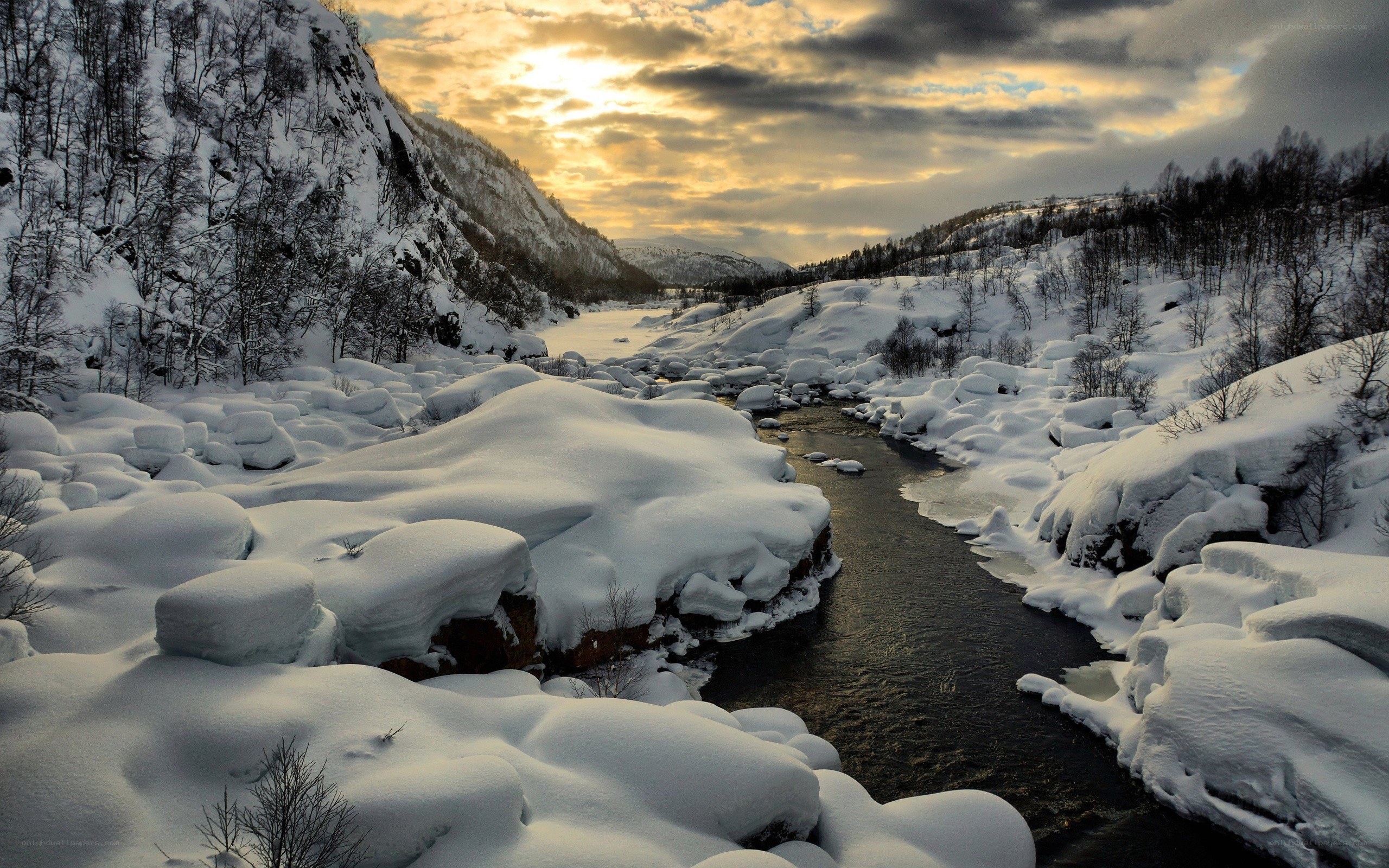 Snowy river at sunset