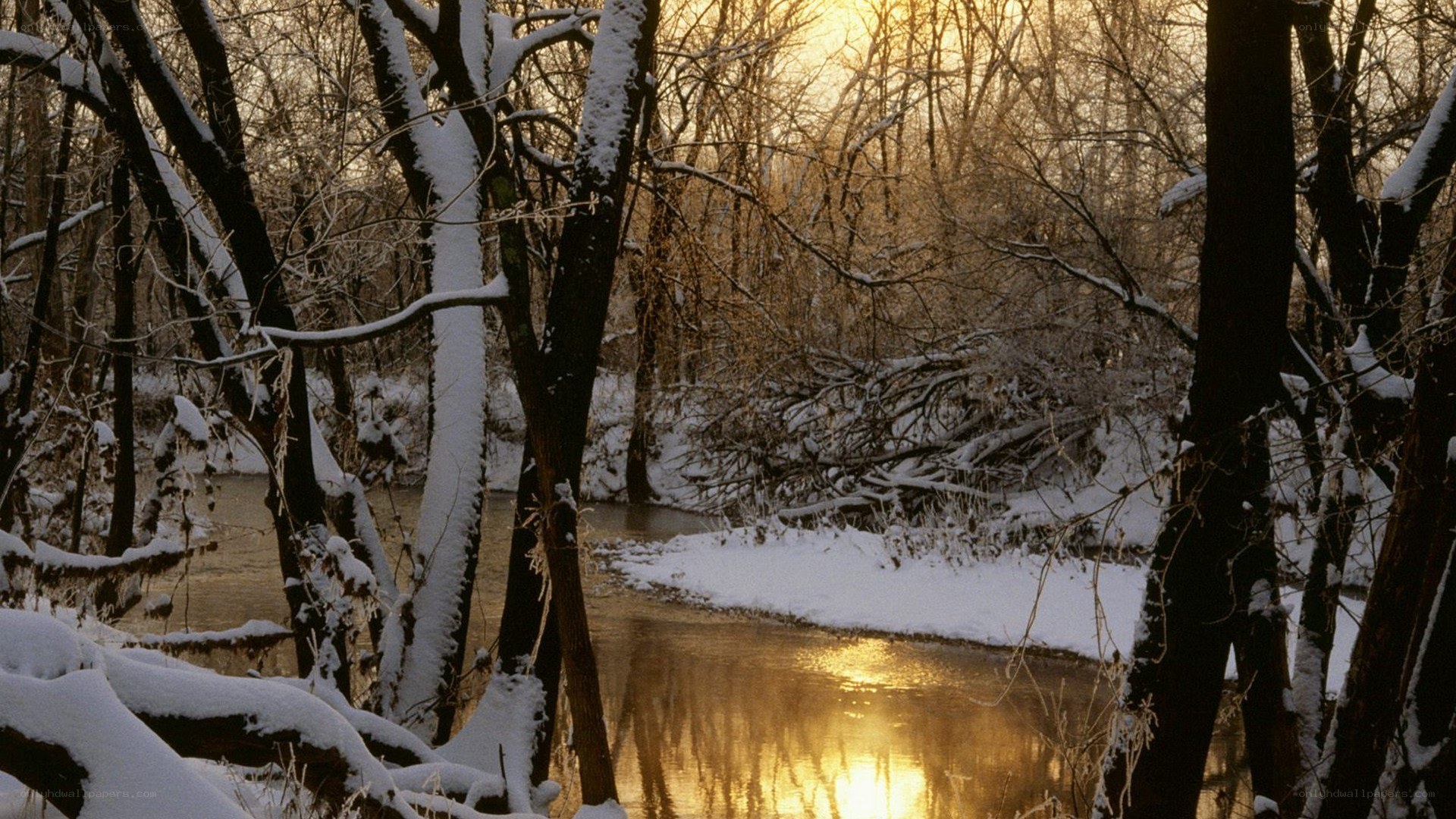 Snowy river at sunset