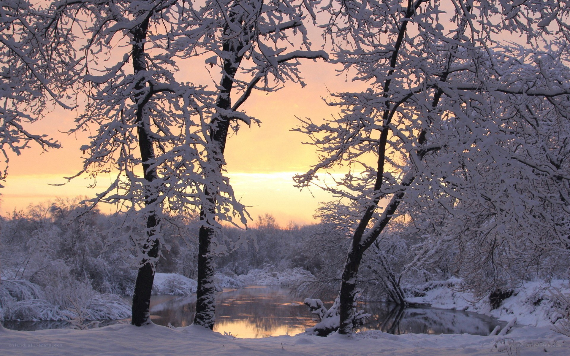 Snowy river at sunset