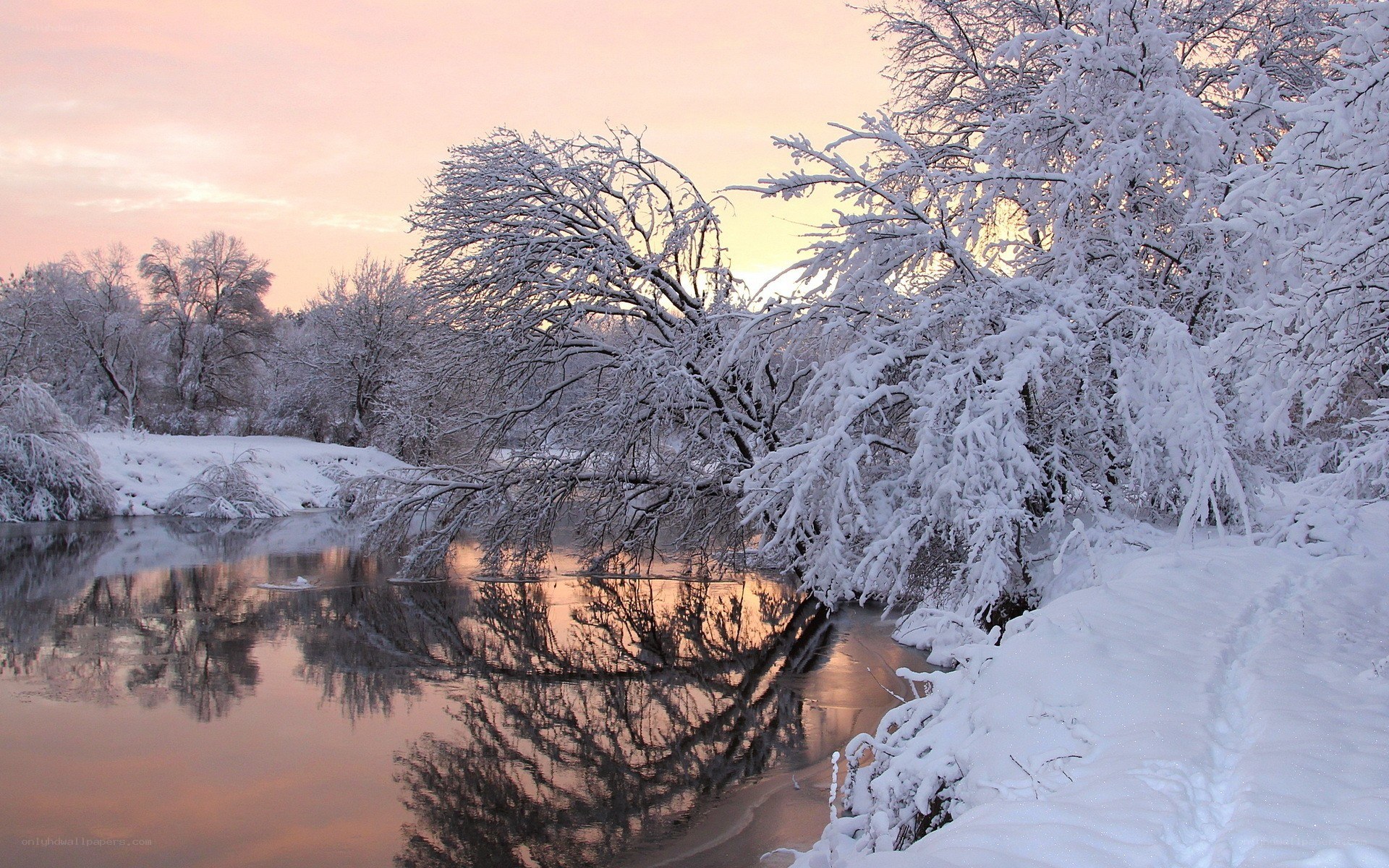 Snowy river at sunset