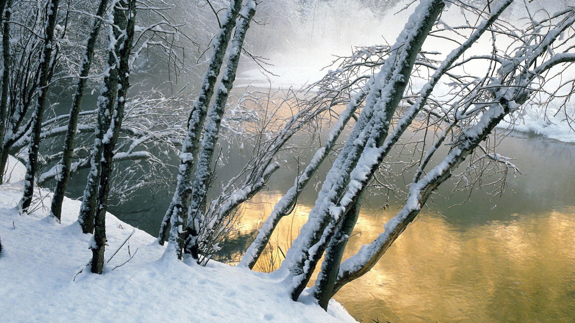 Snowy river at sunset