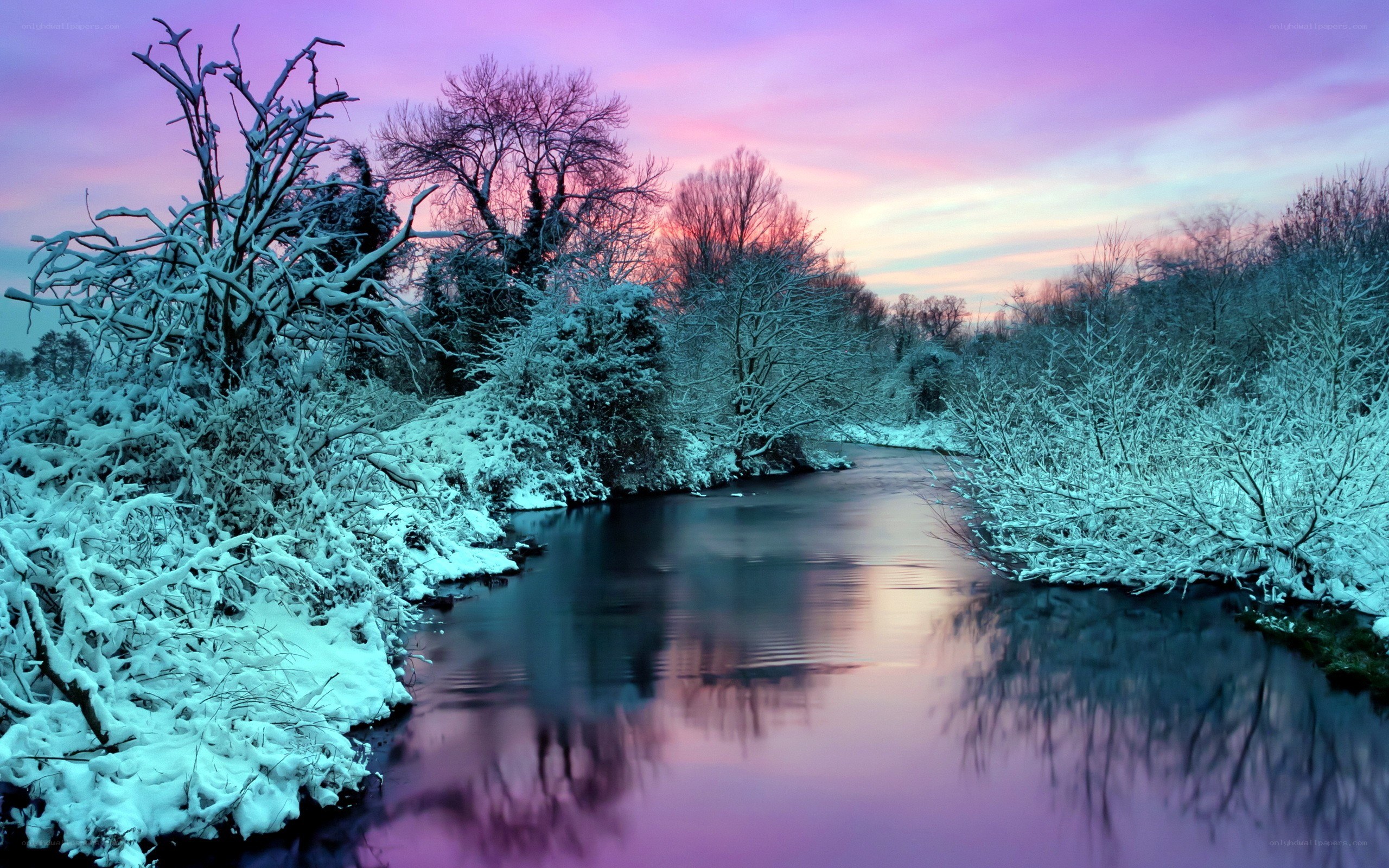 Snowy river at sunset