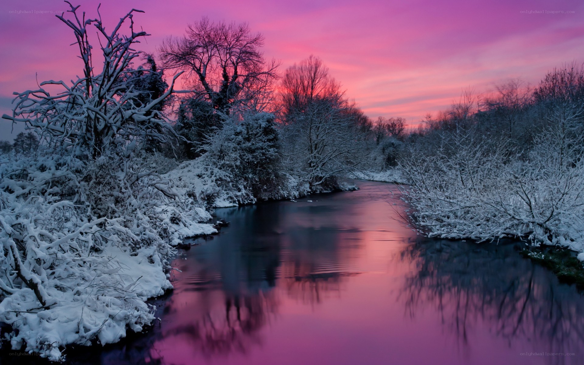 Snowy river at sunset