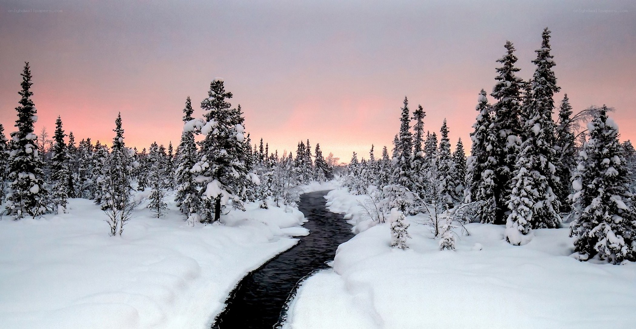 snowy river at sunset