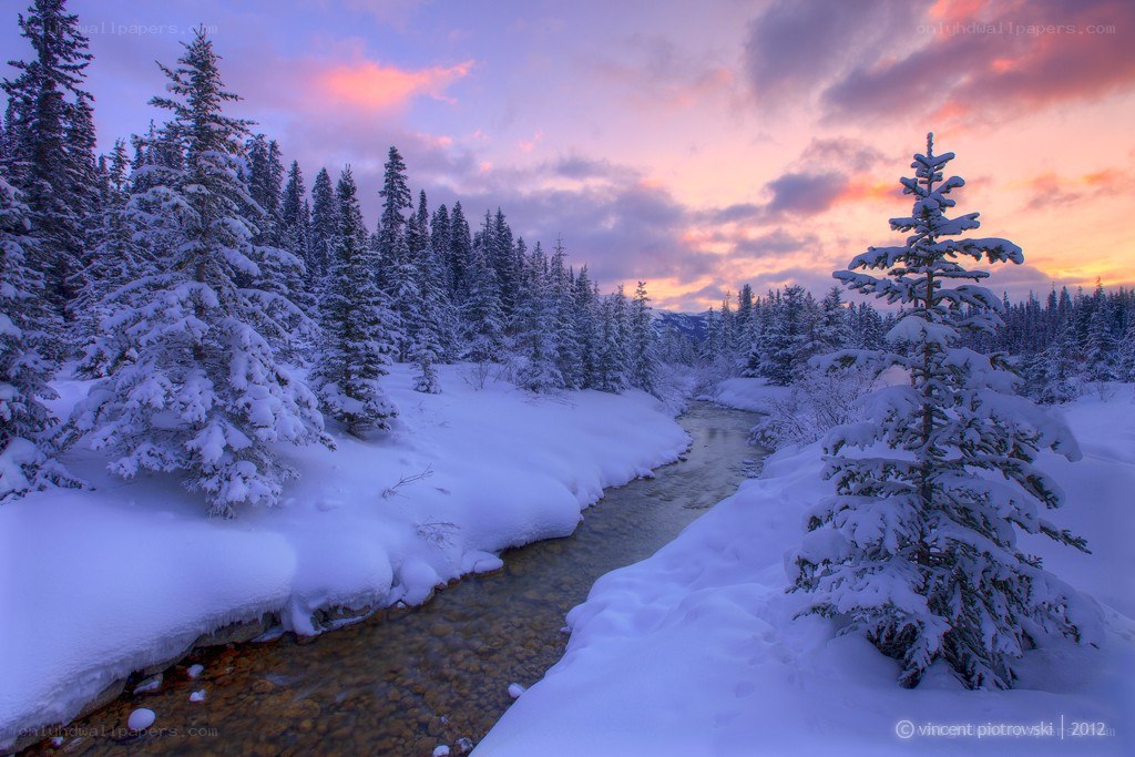 Snowy river at sunset